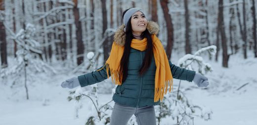 woman smiling in snow