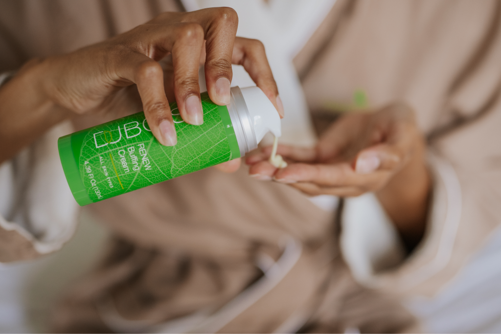 woman's hands dispensing cleanser