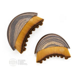 Two wooden lymphatic brushes with brown bristles on a white background